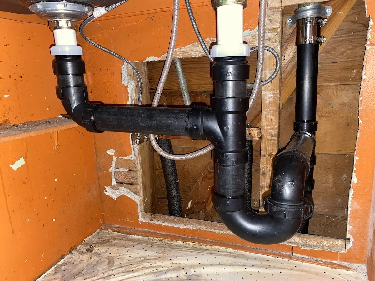 Professional Garbage Disposal Repair equipment and tools on the job in Centerville